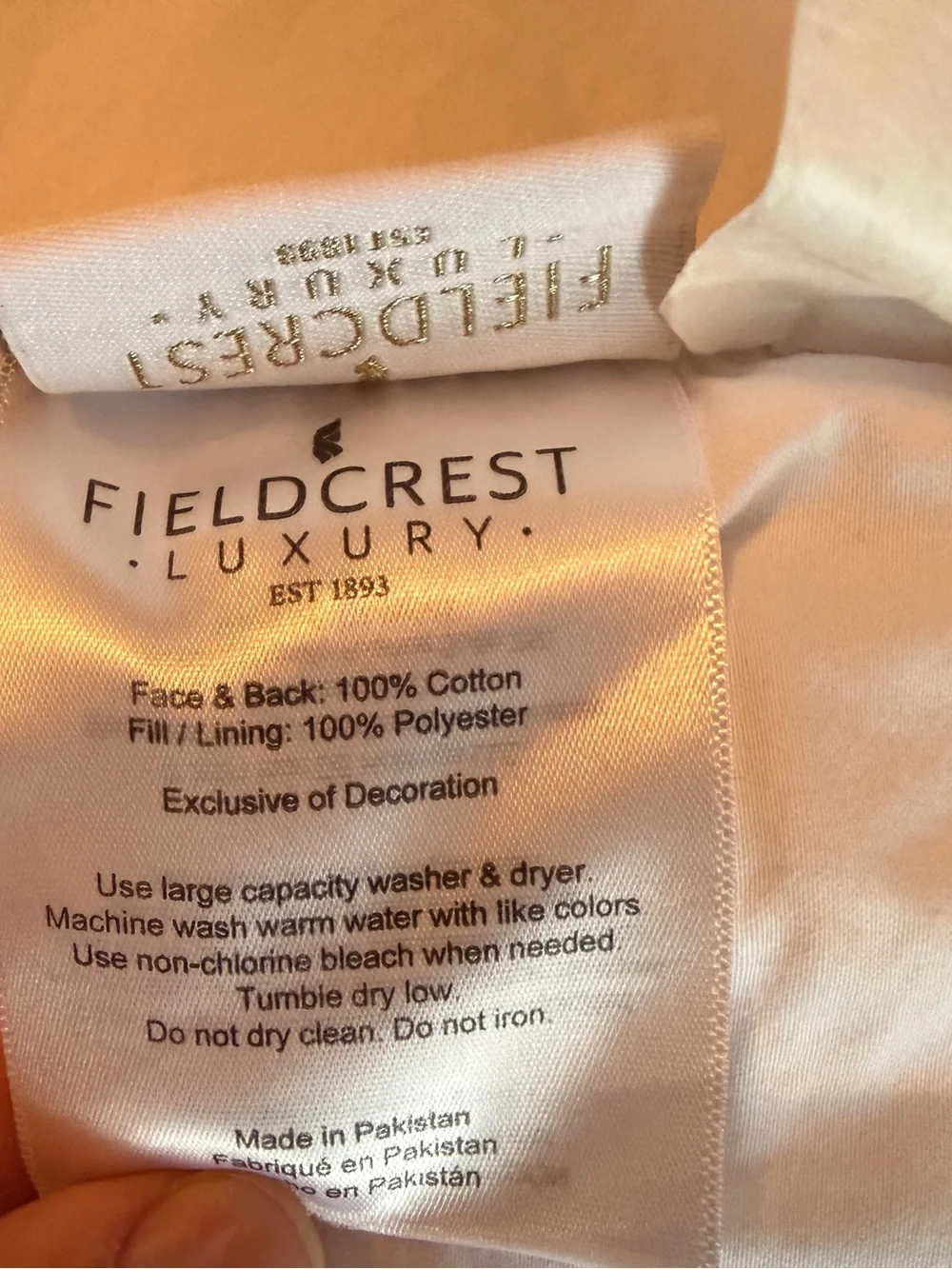 Fieldcrest Luxury Classic comforter and sheets in white with Navy Trim